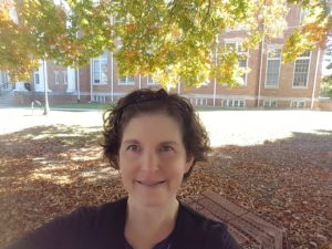 Crystal Colter under a tree on Maryville College campus